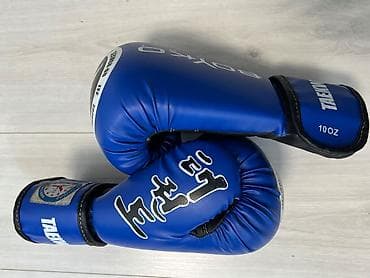 Спорт і хобі: Комплект екіпіровки для єдиноборств таеквондoсиній колір. У наборі: - — 2