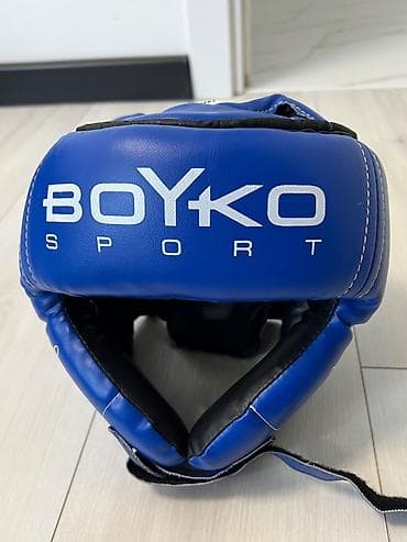 Спорт і хобі: Комплект екіпіровки для єдиноборств таеквондoсиній колір. У наборі: - — 5